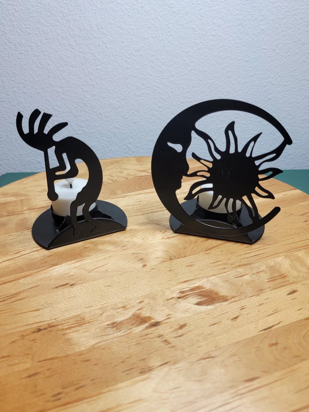 The Southwest Kokopelli Decorative Cast Iron Candle Holders are handmade in the